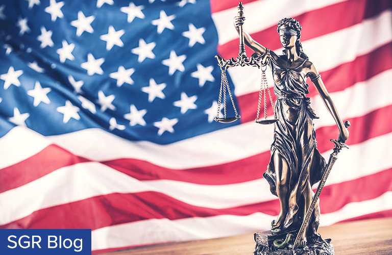 Photo of USA Flag and Lady Justice