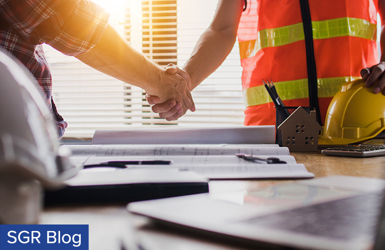 Construction Workers Shaking Hands